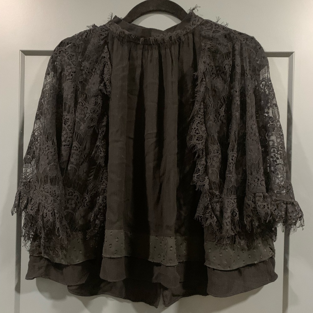Zara, Size Small, Black High neck top. Buttons on back and lacy sleeve details.